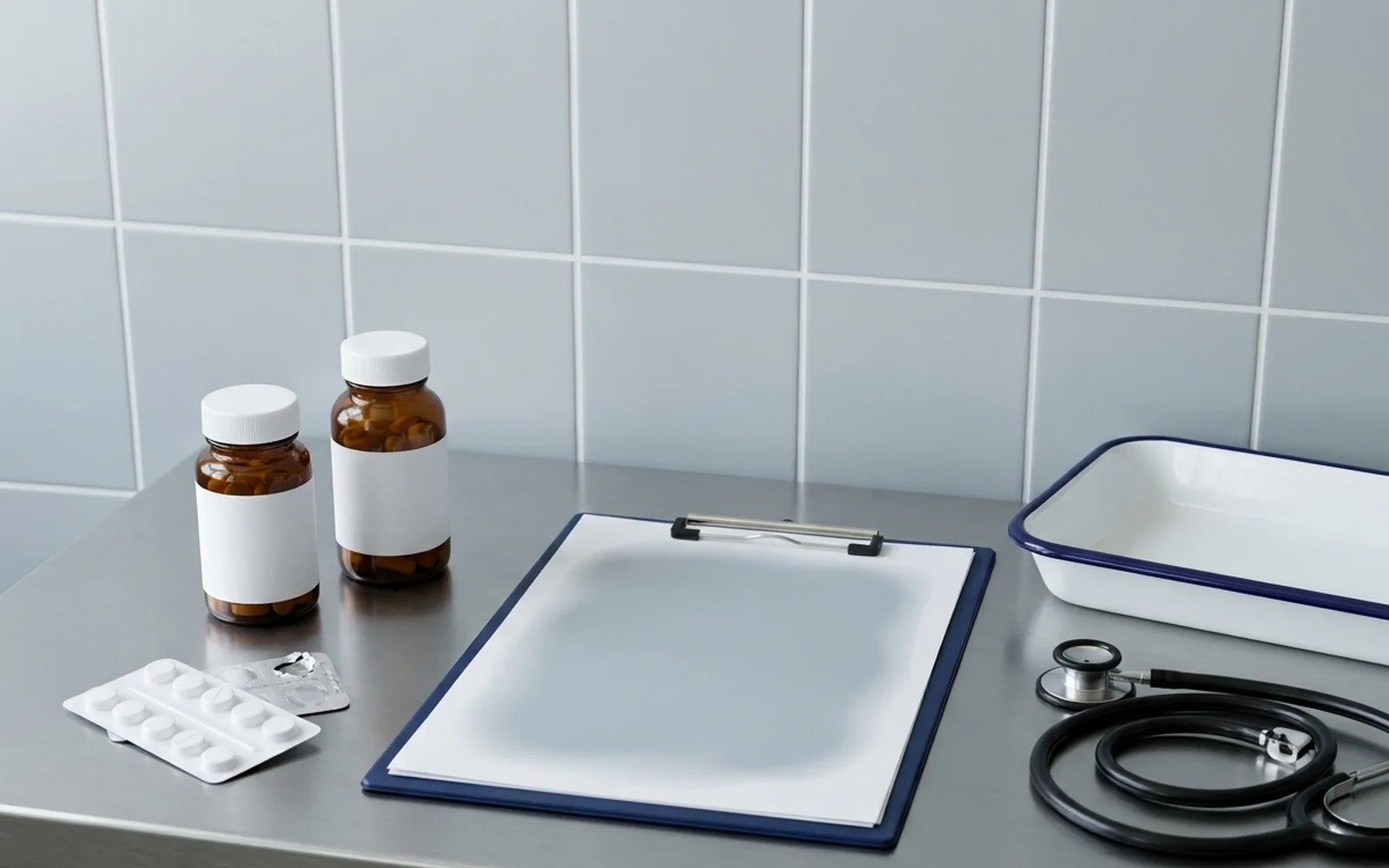 Pharmacy bench with blank-labelled pill bottles, a blister pack, a clipboard and a stethoscope